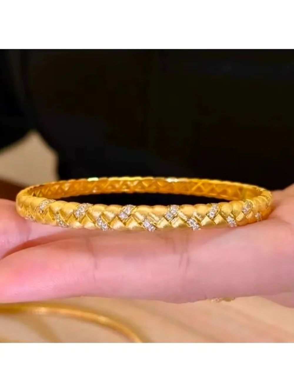 Gold Tone Braided Bangle with Clear Stone Accents